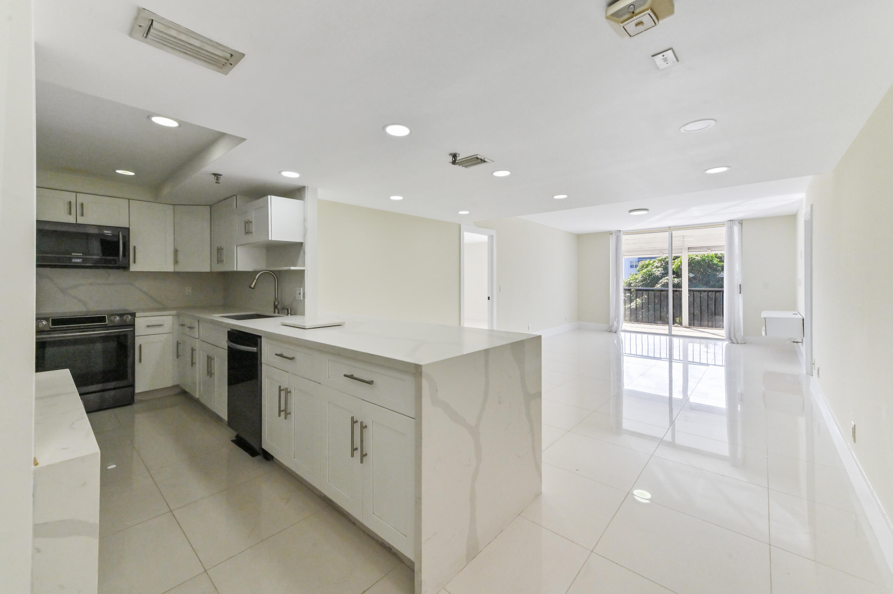 198 Northwest 67th Street, Unit 302 Boca Raton, FL 33487 - Photo 1 of 32 08 Kitchen 01