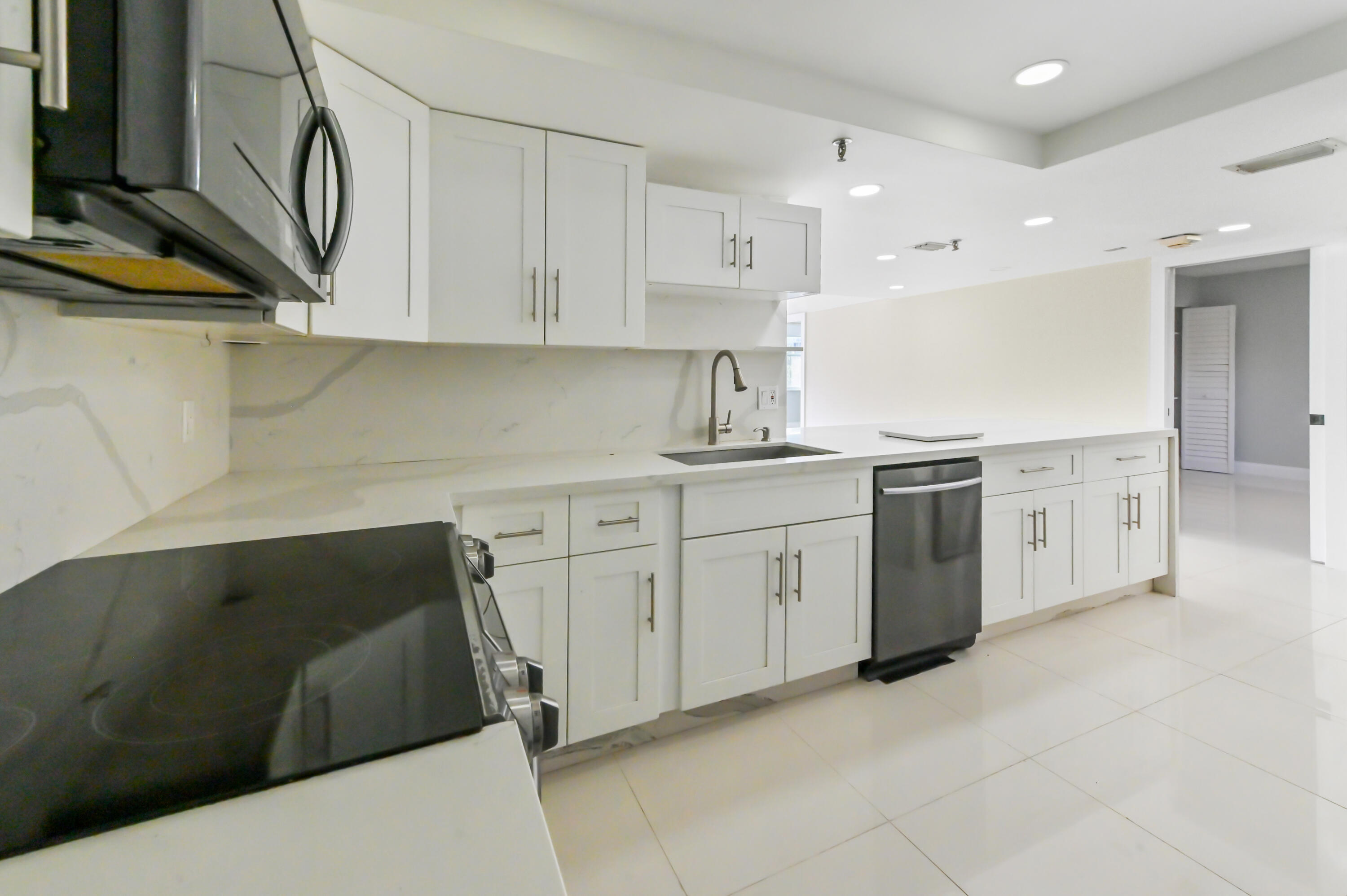 198 Northwest 67th Street, Unit 302 Boca Raton, FL 33487 - Photo 3 of 32 13 Kitchen 05