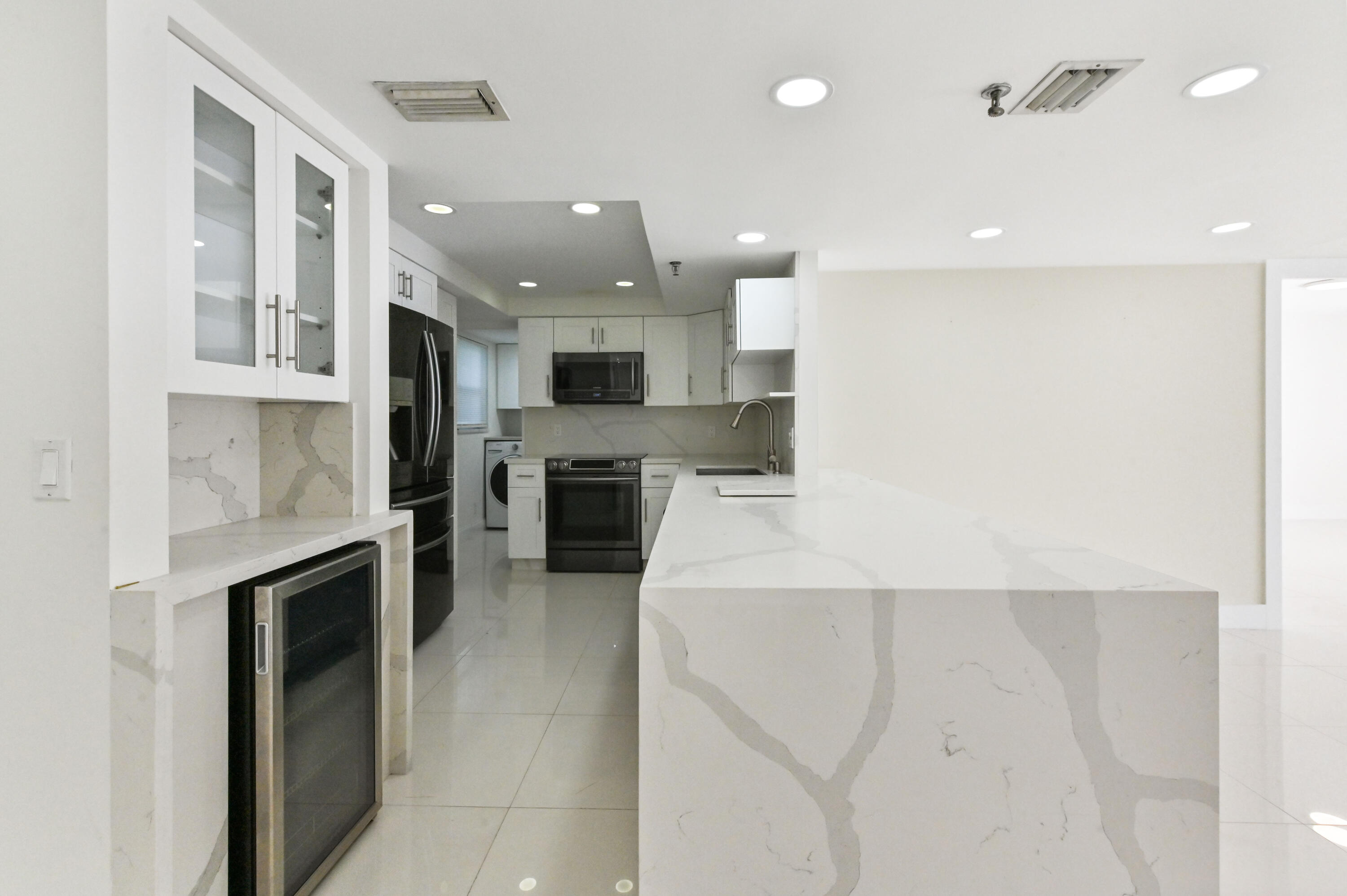 198 Northwest 67th Street, Unit 302 Boca Raton, FL 33487 - Photo 5 of 32 09 Kitchen 01