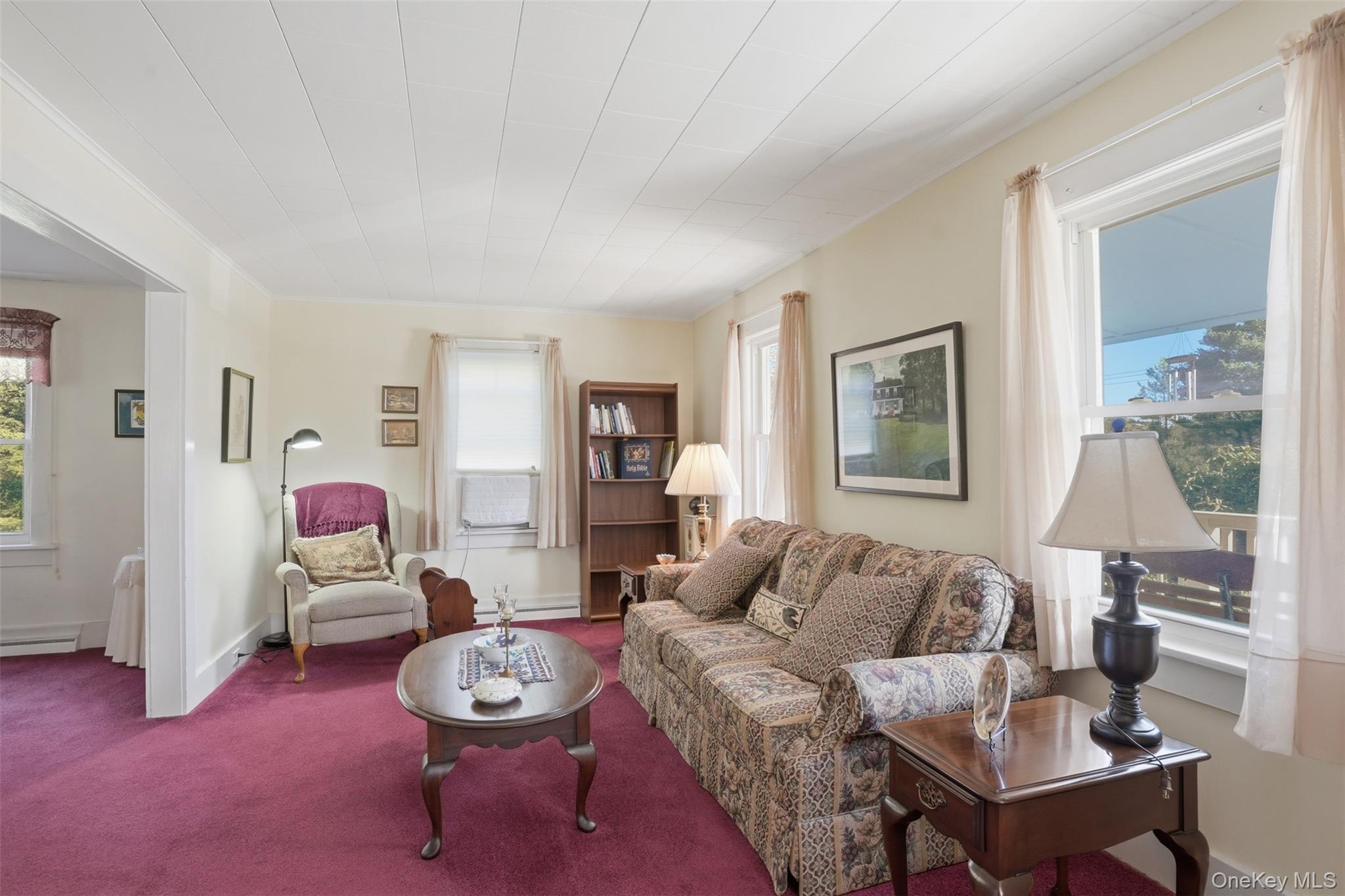 114 Proctor Road Eldred, NY 12732 - Photo 13 of 38 a living room with furniture and a potted plant