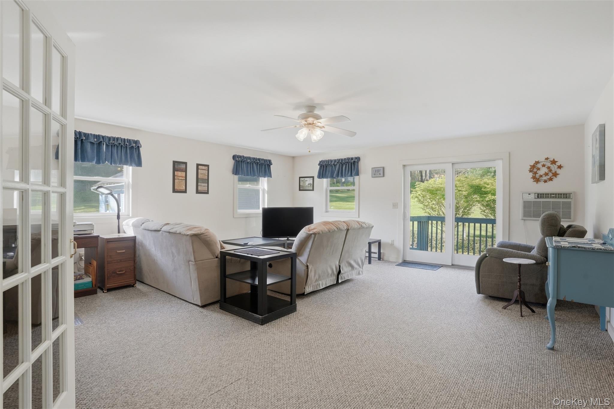 114 Proctor Road Eldred, NY 12732 - Photo 15 of 38 a living room with furniture and a window