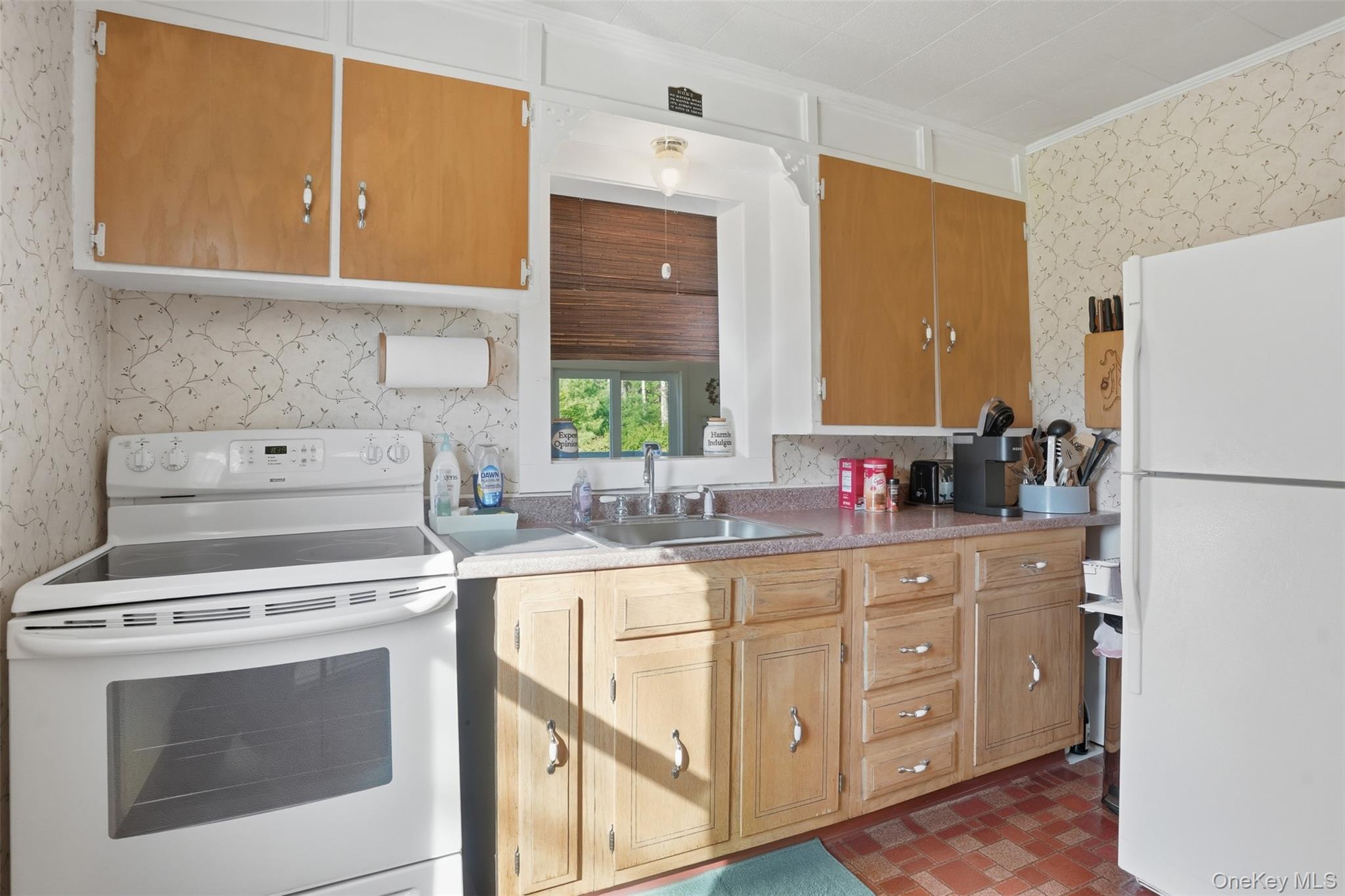 114 Proctor Road Eldred, NY 12732 - Photo 20 of 38 a kitchen with a stove sink and cabinets