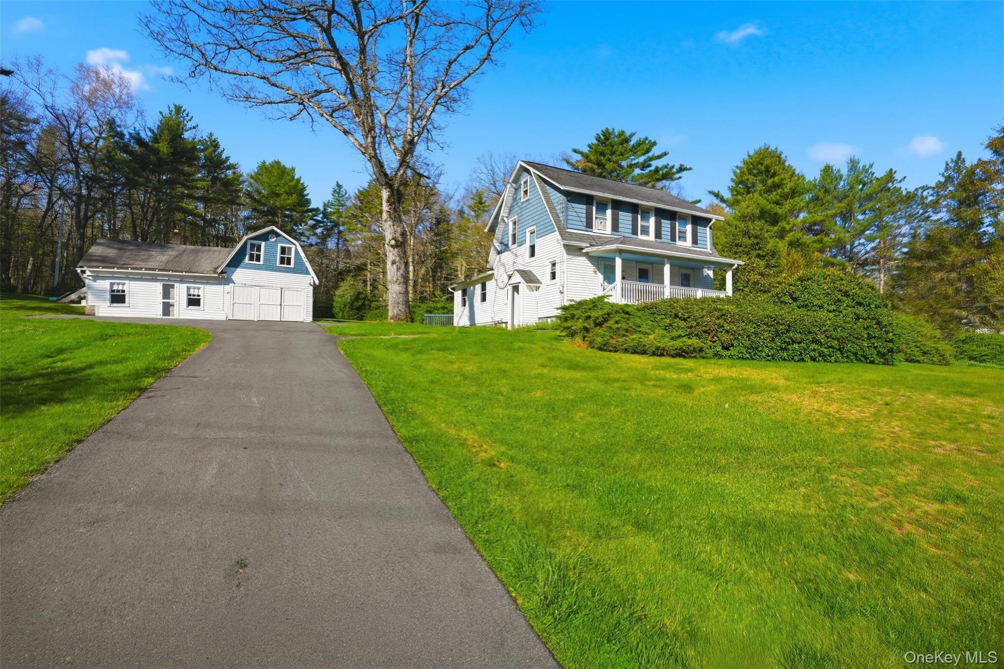 114 Proctor Road Eldred, NY 12732 - Photo 2 of 38 a front view of a house with garden