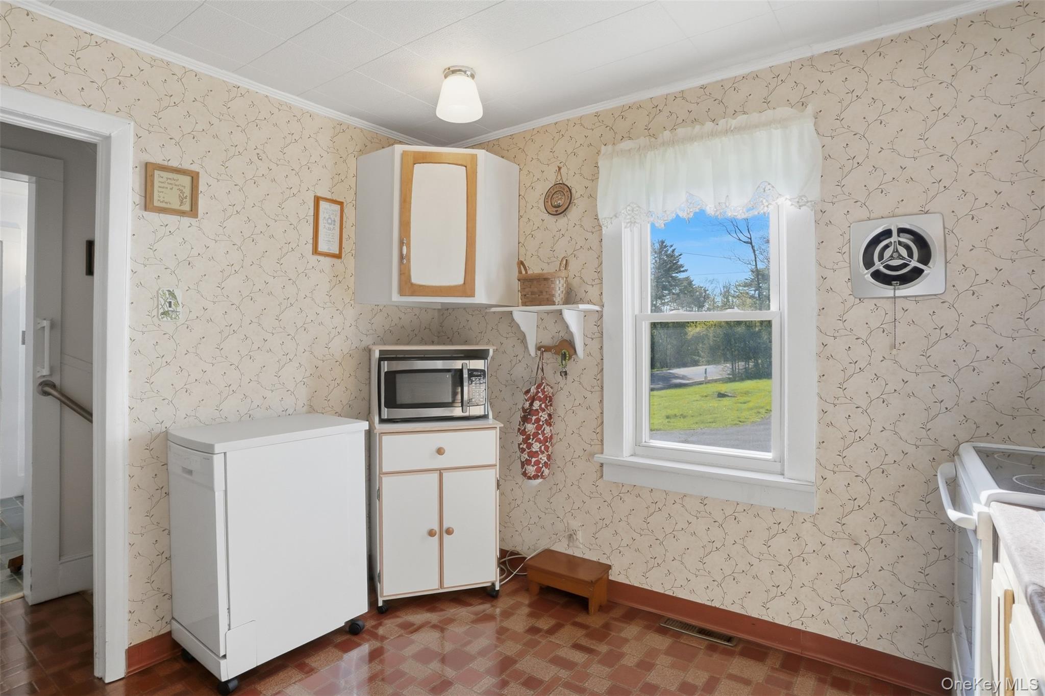 114 Proctor Road Eldred, NY 12732 - Photo 21 of 38 a kitchen with a refrigerator and a stove