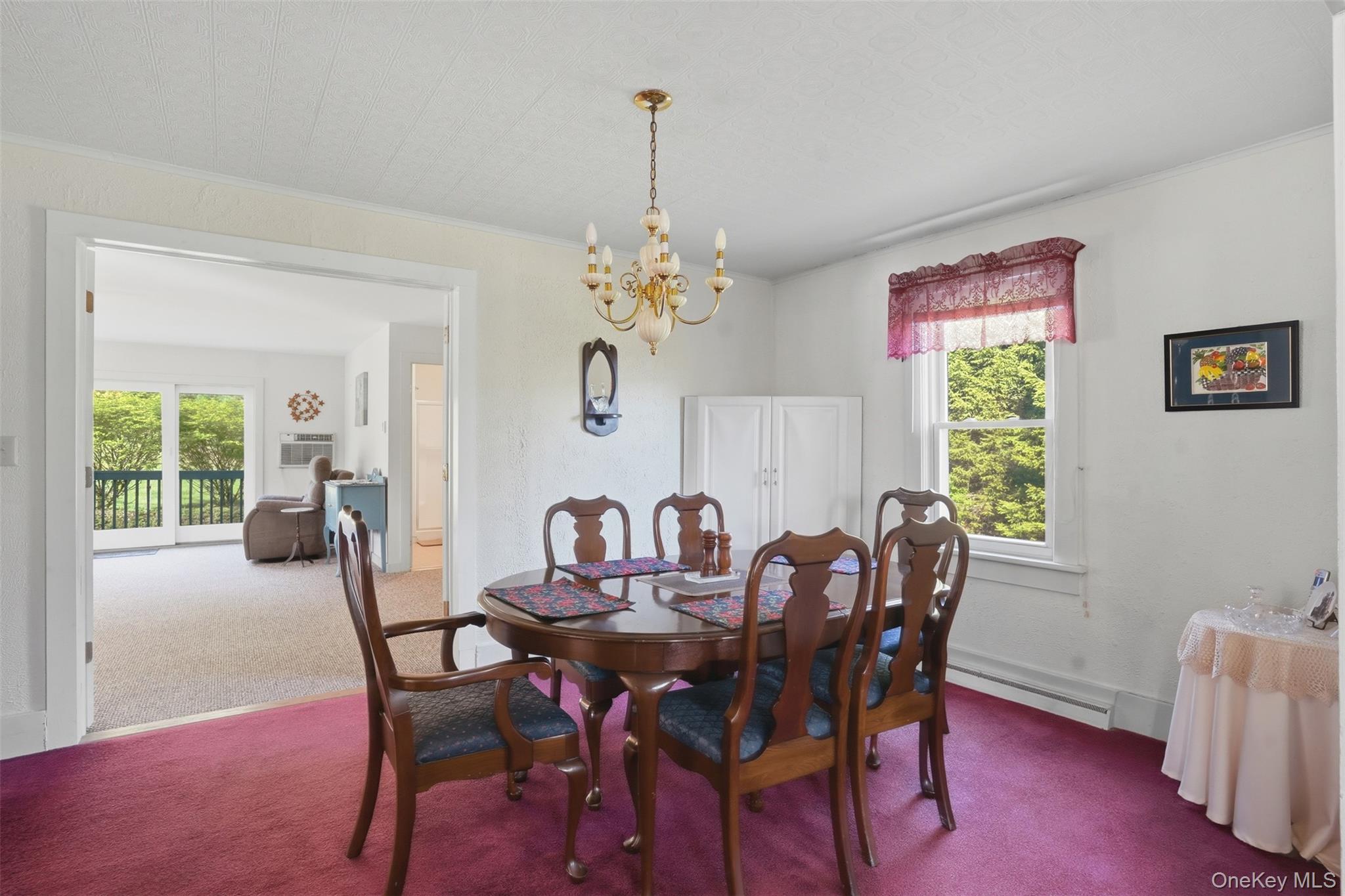 114 Proctor Road Eldred, NY 12732 - Photo 22 of 38 a view of a dining room with furniture window and outside view