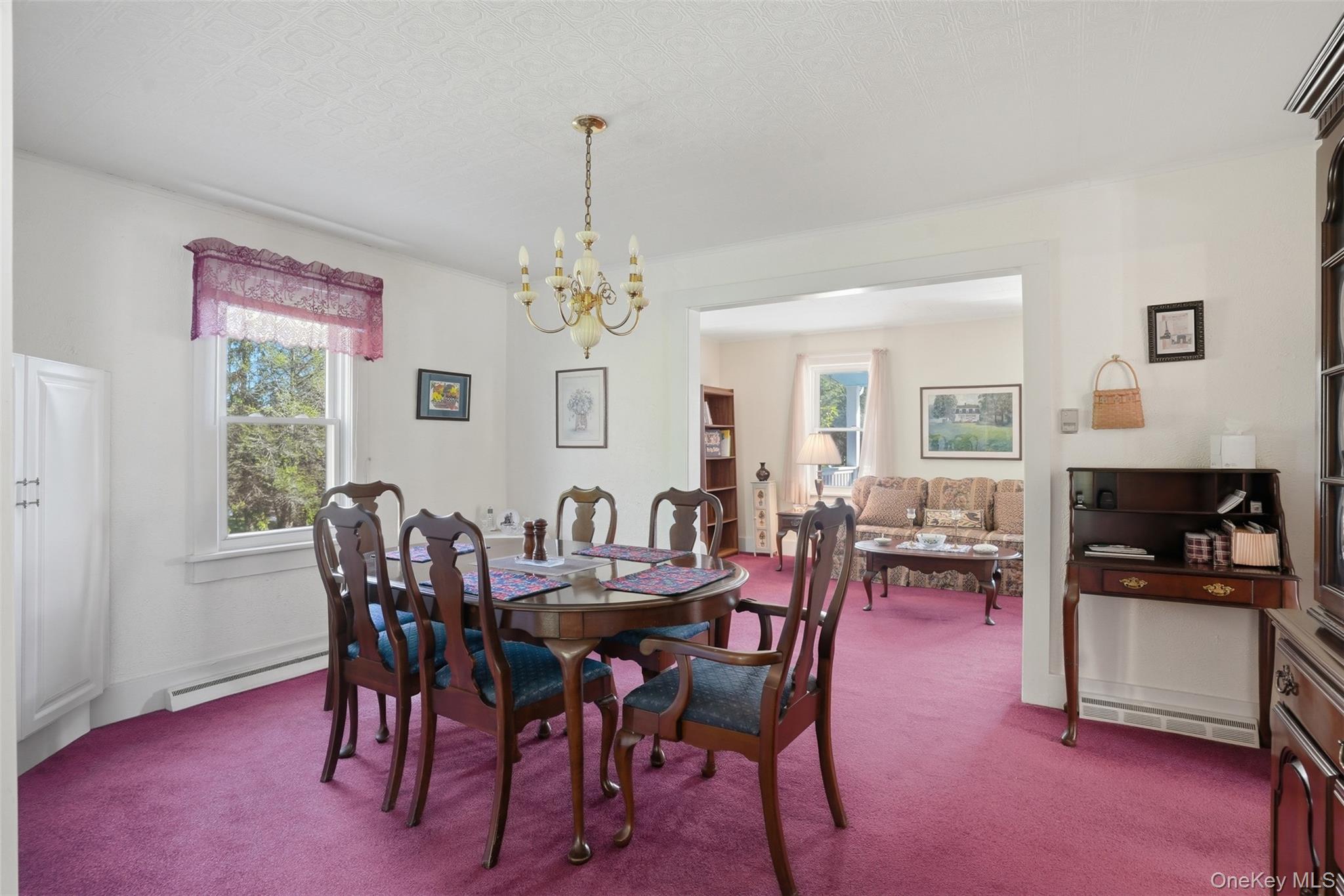 114 Proctor Road Eldred, NY 12732 - Photo 23 of 38 a view of a dining room with furniture and chandelier