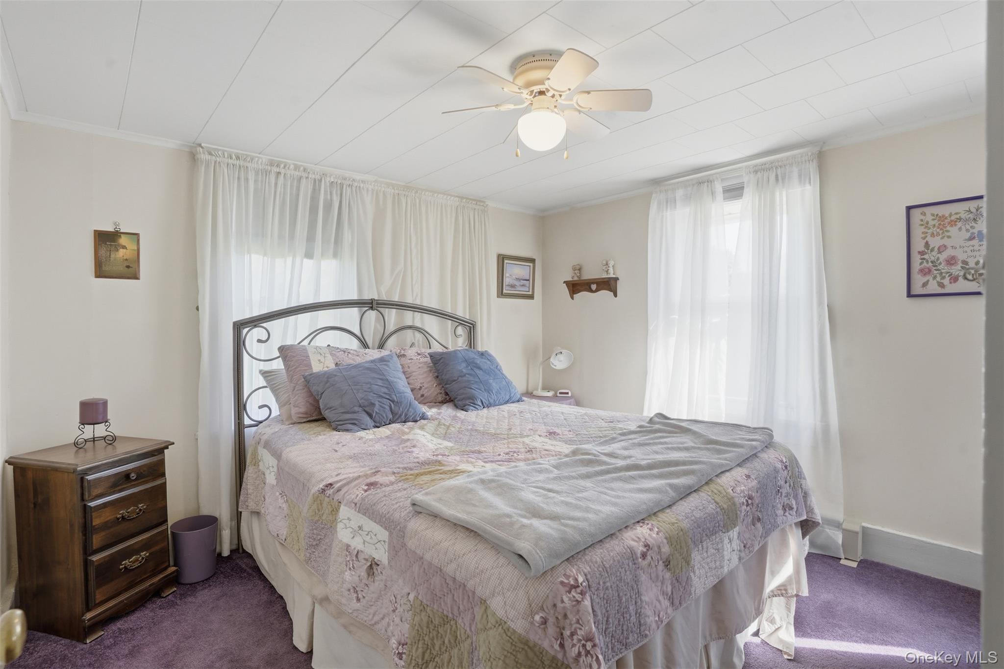 114 Proctor Road Eldred, NY 12732 - Photo 24 of 38 a bedroom with a bed and a chandelier
