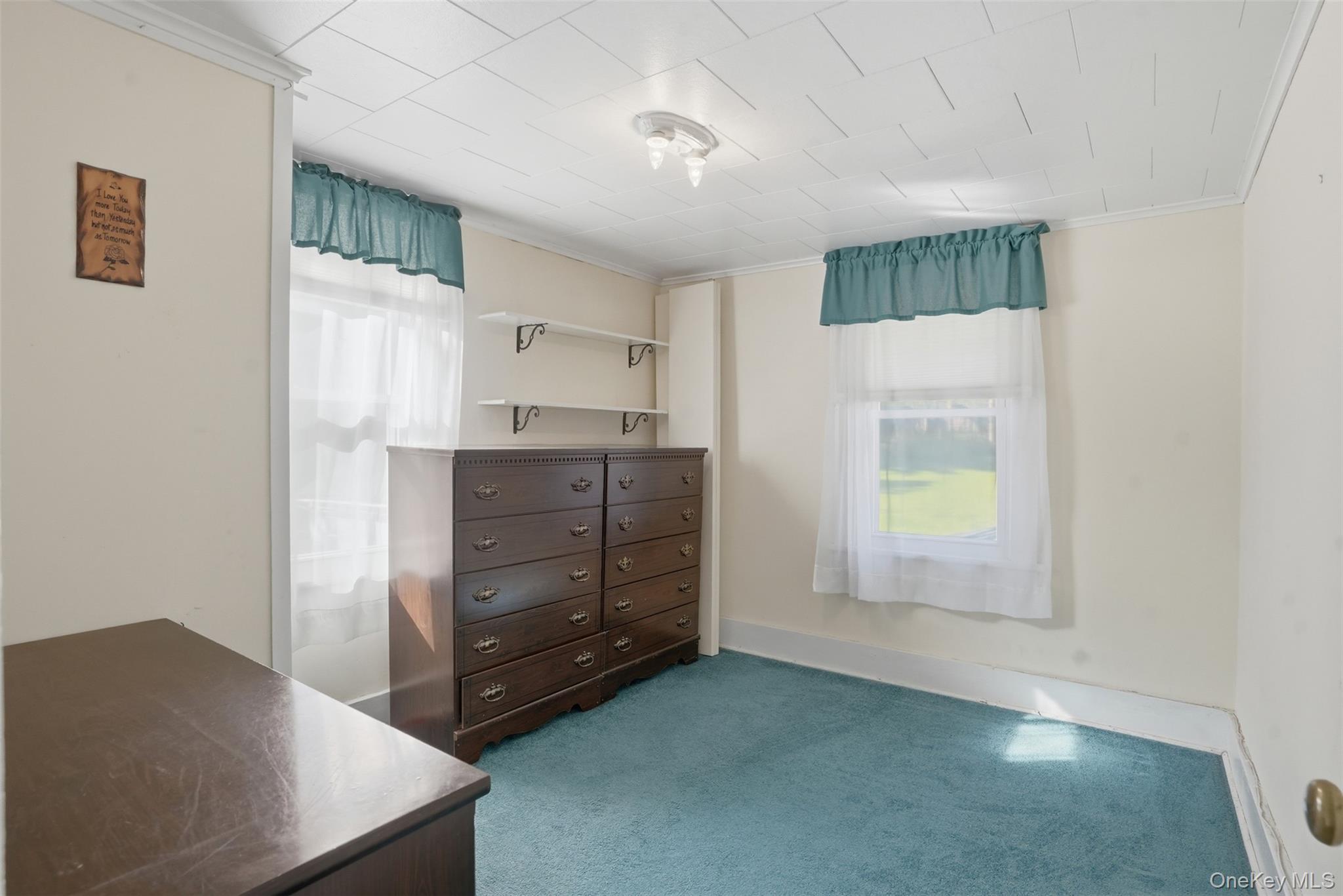 114 Proctor Road Eldred, NY 12732 - Photo 27 of 38 a room with windows and cabinet