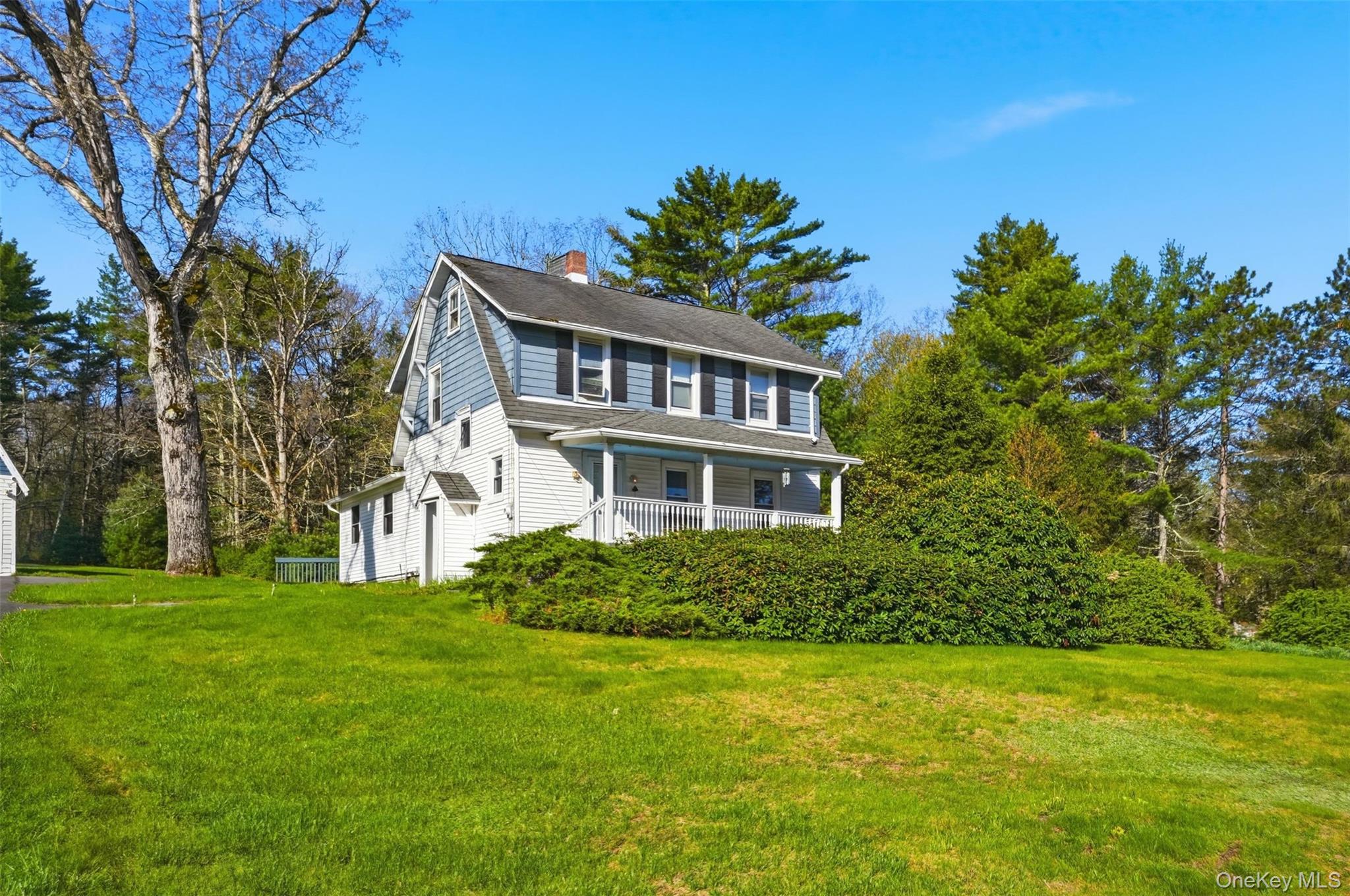 114 Proctor Road Eldred, NY 12732 - Photo 3 of 38 a front view of a house with a garden
