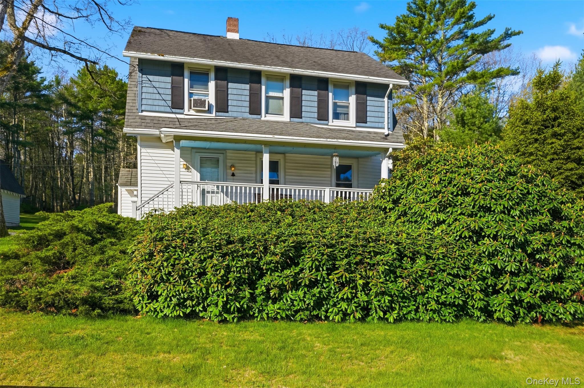 114 Proctor Road Eldred, NY 12732 - Photo 4 of 38 a front view of a house with a garden