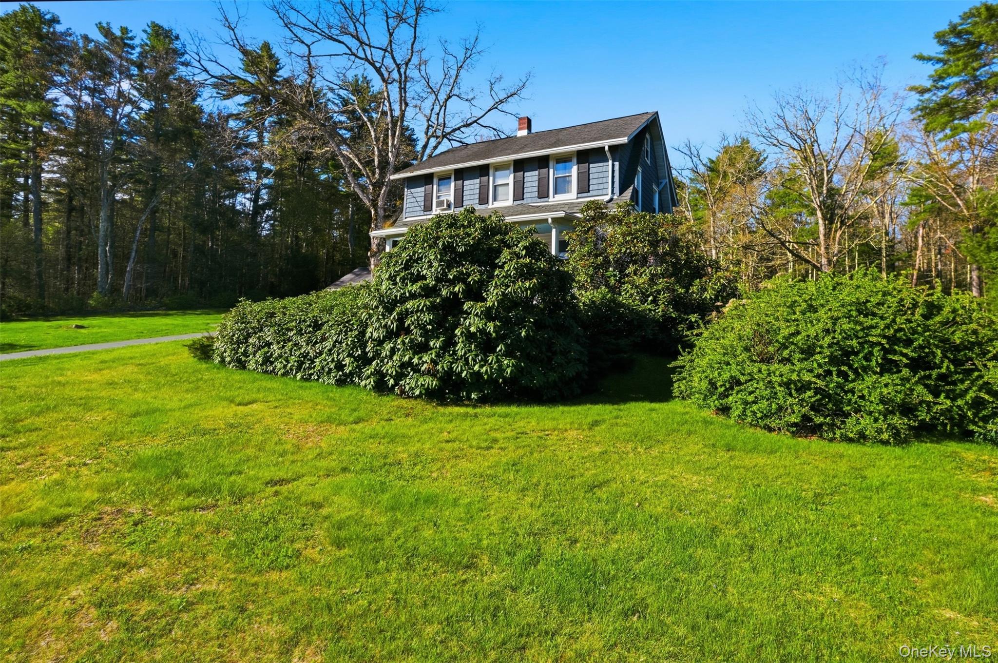 114 Proctor Road Eldred, NY 12732 - Photo 5 of 38 a front view of a house with a garden