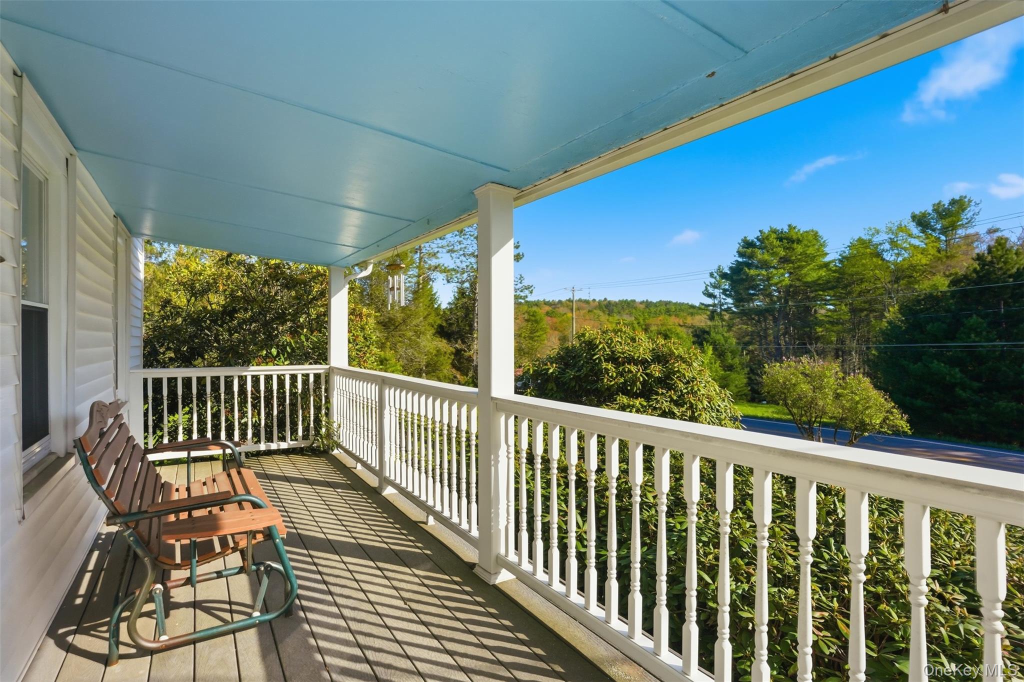 114 Proctor Road Eldred, NY 12732 - Photo 10 of 38 a view of a two chairs in the balcony