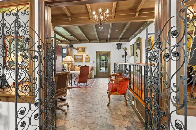a view of a chairs and table in a patio
