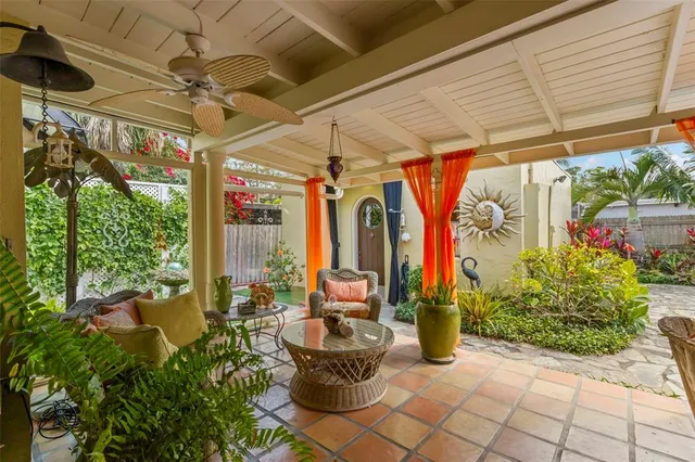 a view of a chairs and table in the patio