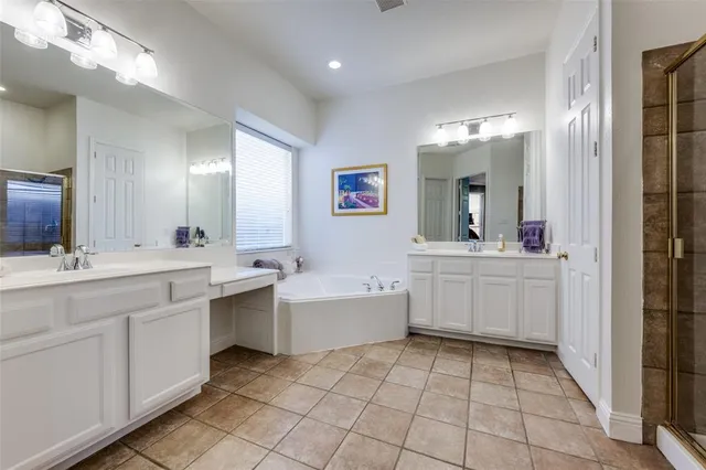 a bathroom with a sink a vanity and a mirror
