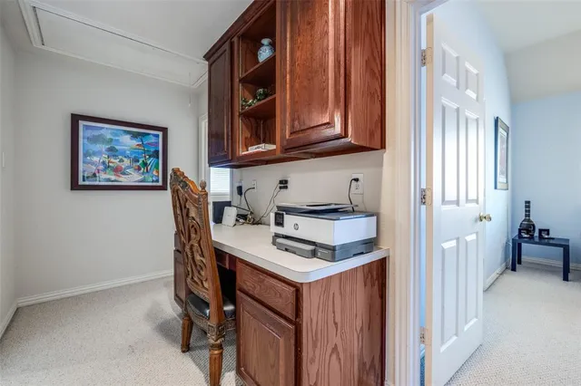 a room that has a table and chair in it