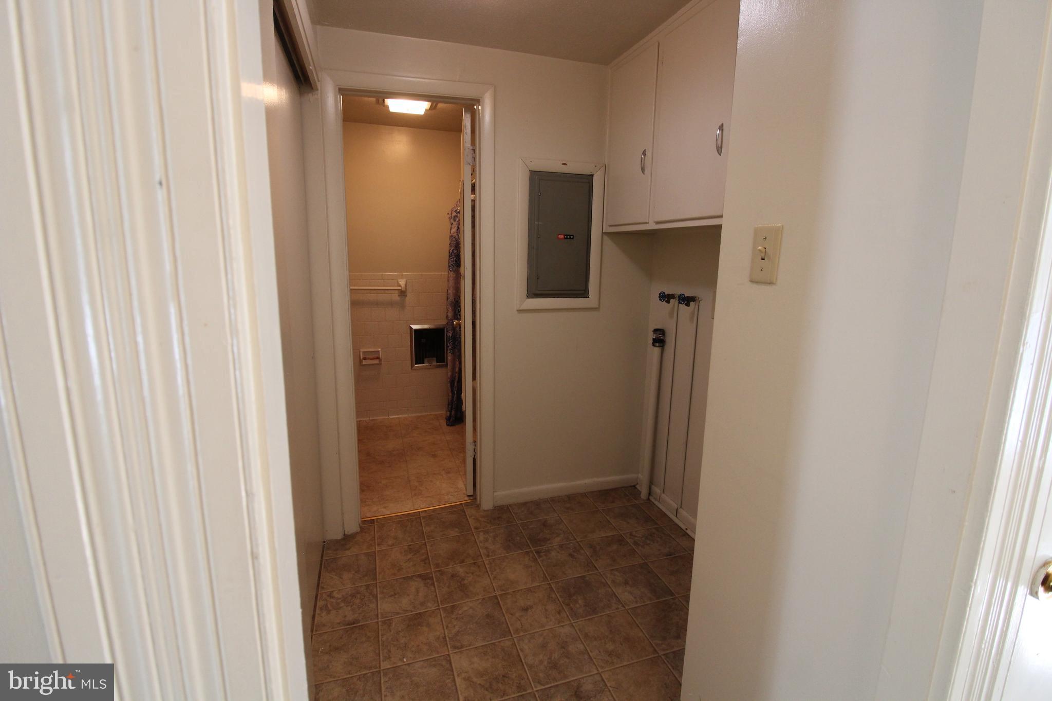 18947 Senedo Road, Unit 4 Edinburg, VA 22824 - Photo 13 of 15 a view of a hallway with a bathroom
