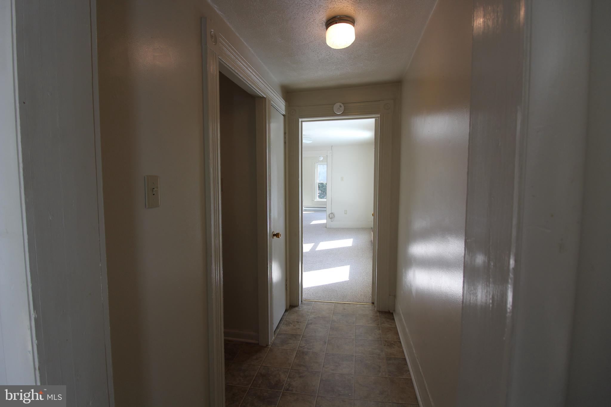 18947 Senedo Road, Unit 4 Edinburg, VA 22824 - Photo 6 of 15 a view of a hallway