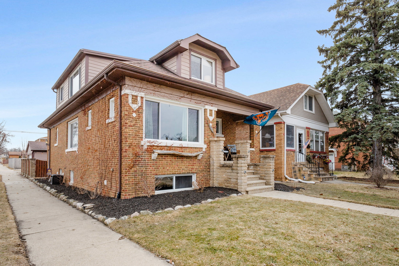 3201 Park Avenue Brookfield, IL 60513 - Photo 2 of 22 a front view of a house with a yard