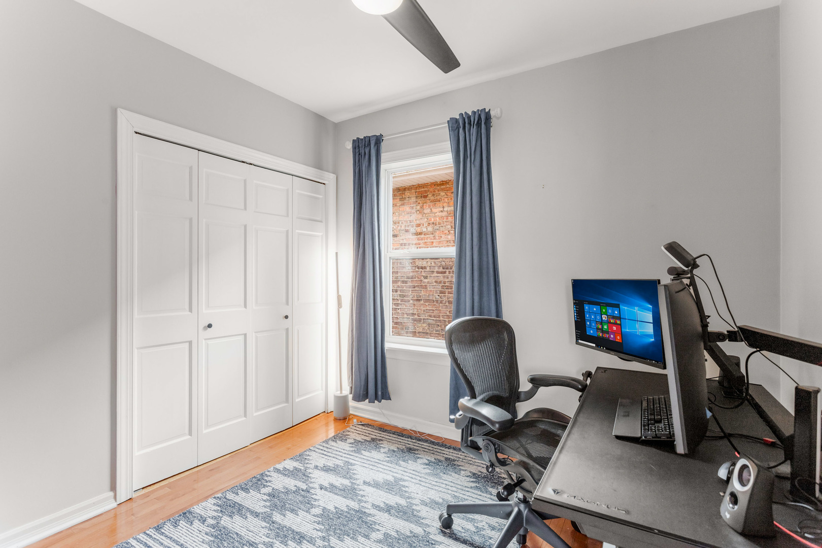 3201 Park Avenue Brookfield, IL 60513 - Photo 8 of 22 a view of a workspace with furniture and a window