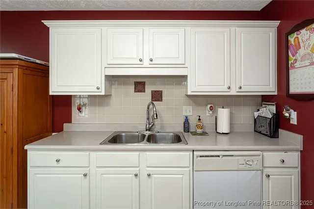 a view of kitchen with washer and dryer
