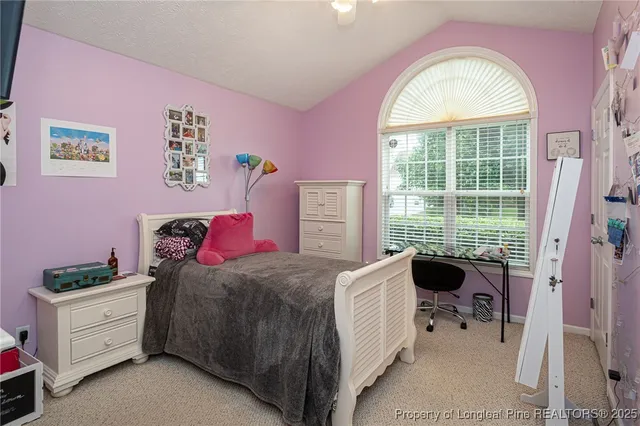 a room with furniture and a window