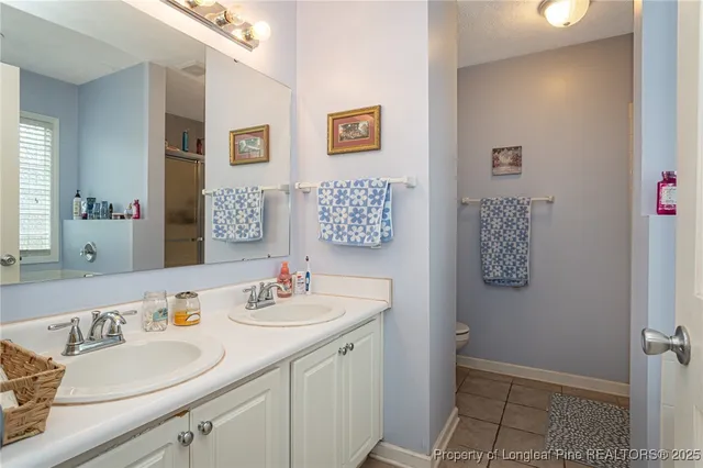 a bathroom with a bathtub and a window
