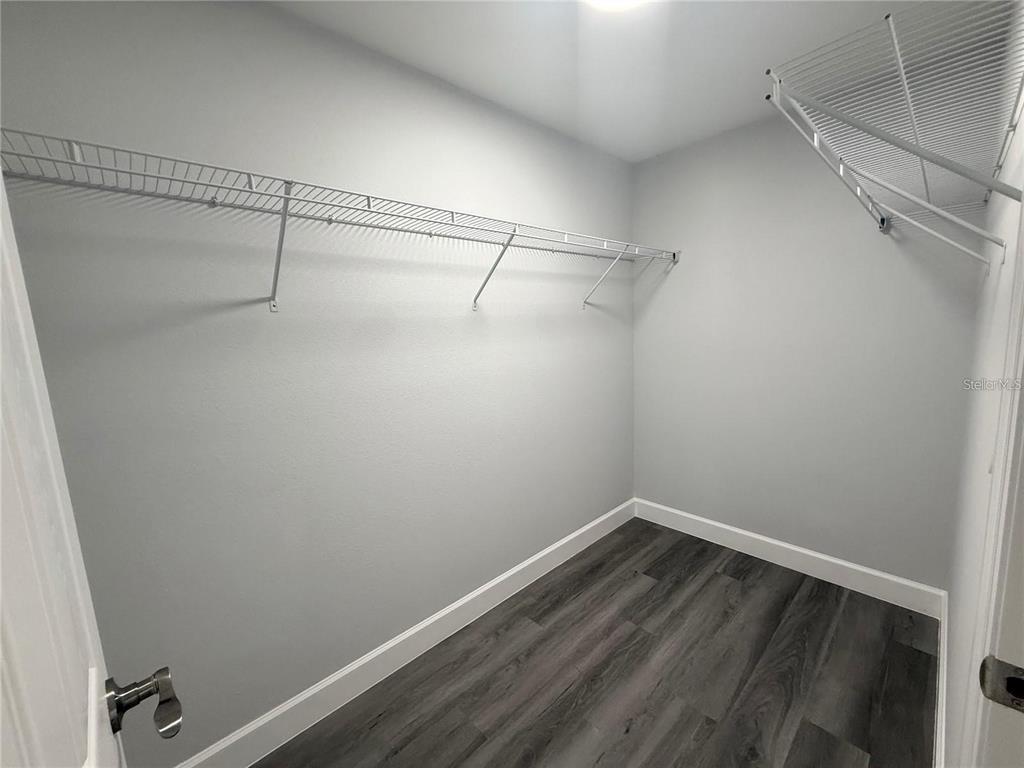 3577 Southwest 149th Terrace Ocala, FL 34481 - Photo 18 of 31 a view of a room with racks on the wall