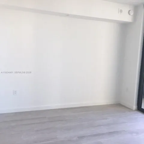 a bathroom with a sink vanity and a mirror