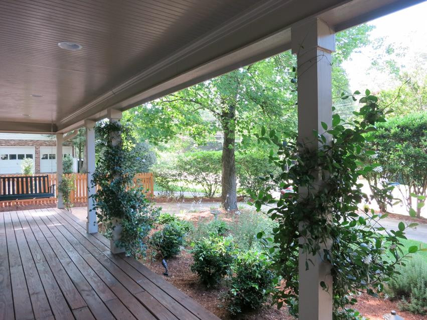 704 Currituck Drive Raleigh, NC 27609 - Photo 2 of 25 View of the deep Front Porch w/porch swing. Home features beautiful hardwood floors, crown molding, tile Baths & honed granite throughout! Front Porch