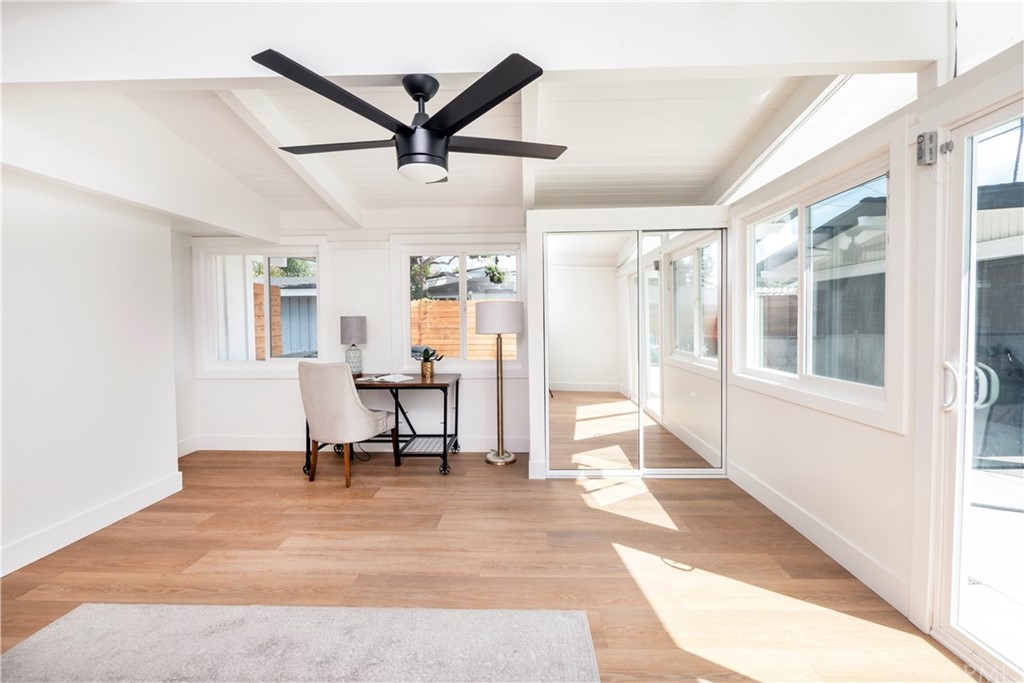 3316 North Studebaker Road Long Beach, CA 90808 - Photo 13 of 29 a living room with furniture and a large window