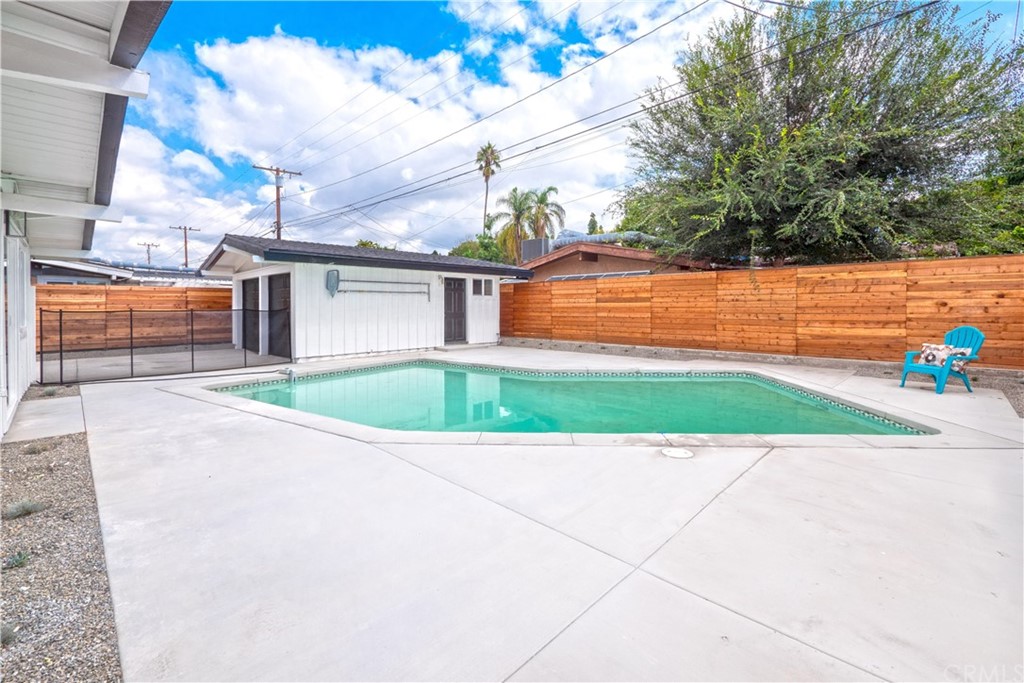 3316 North Studebaker Road Long Beach, CA 90808 - Photo 18 of 29 a view of a backyard with potted plants