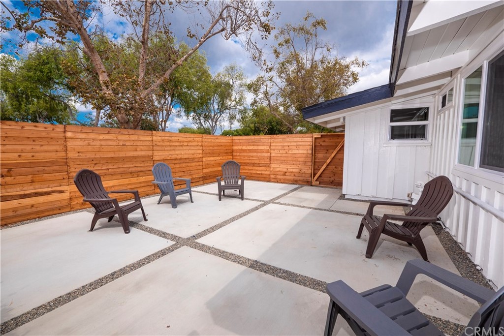 3316 North Studebaker Road Long Beach, CA 90808 - Photo 22 of 29 a patio with table and chairs