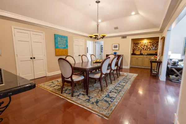 a view of a dining room with furniture