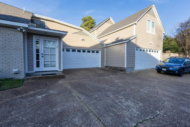 a view of a house with a garage