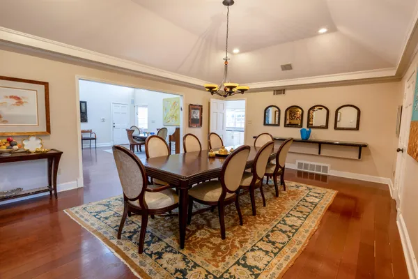 a view of a dining room with furniture