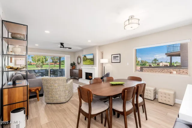 a view of a dining room with furniture window and outside view