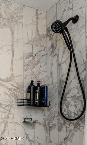 a living room with furniture flat screen tv and a fireplace