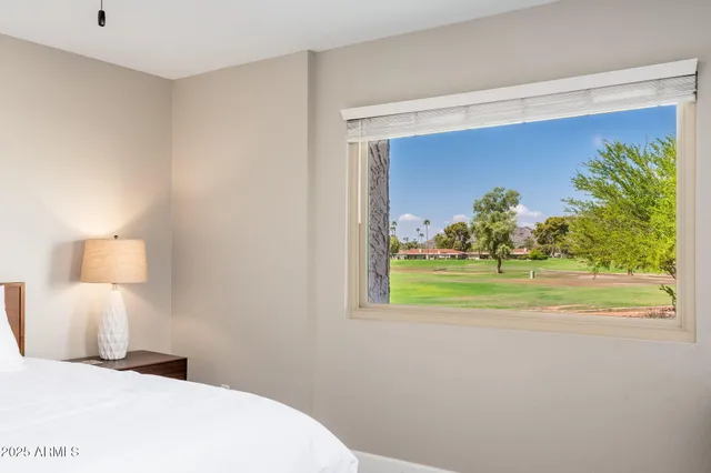 a bedroom with a bed and furniture