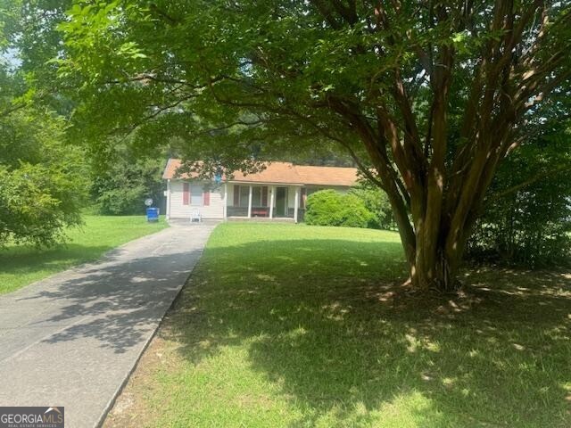 465 Morton Springs Road Cedartown, GA 30125 - Photo 1 of 1 a front view of a house with yard and green space