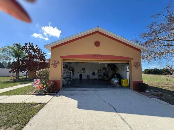 a view of a lounge chair and a garage