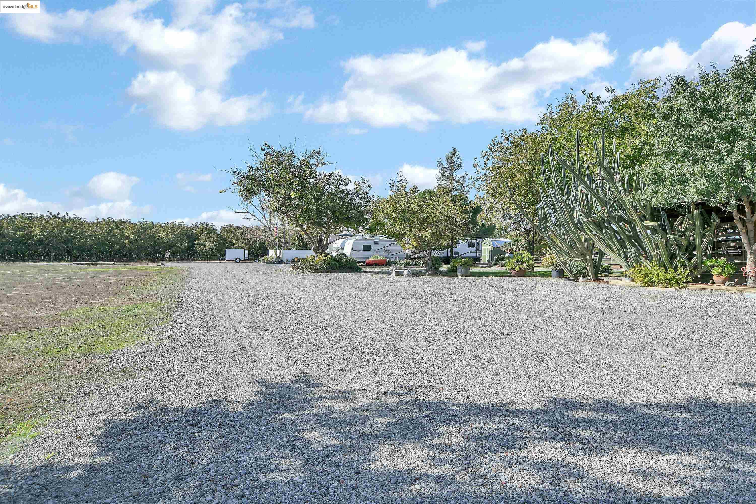 23701 Marsh Creek Road Brentwood, CA 94513 - Photo 22 of 52 a view of a road with a yard