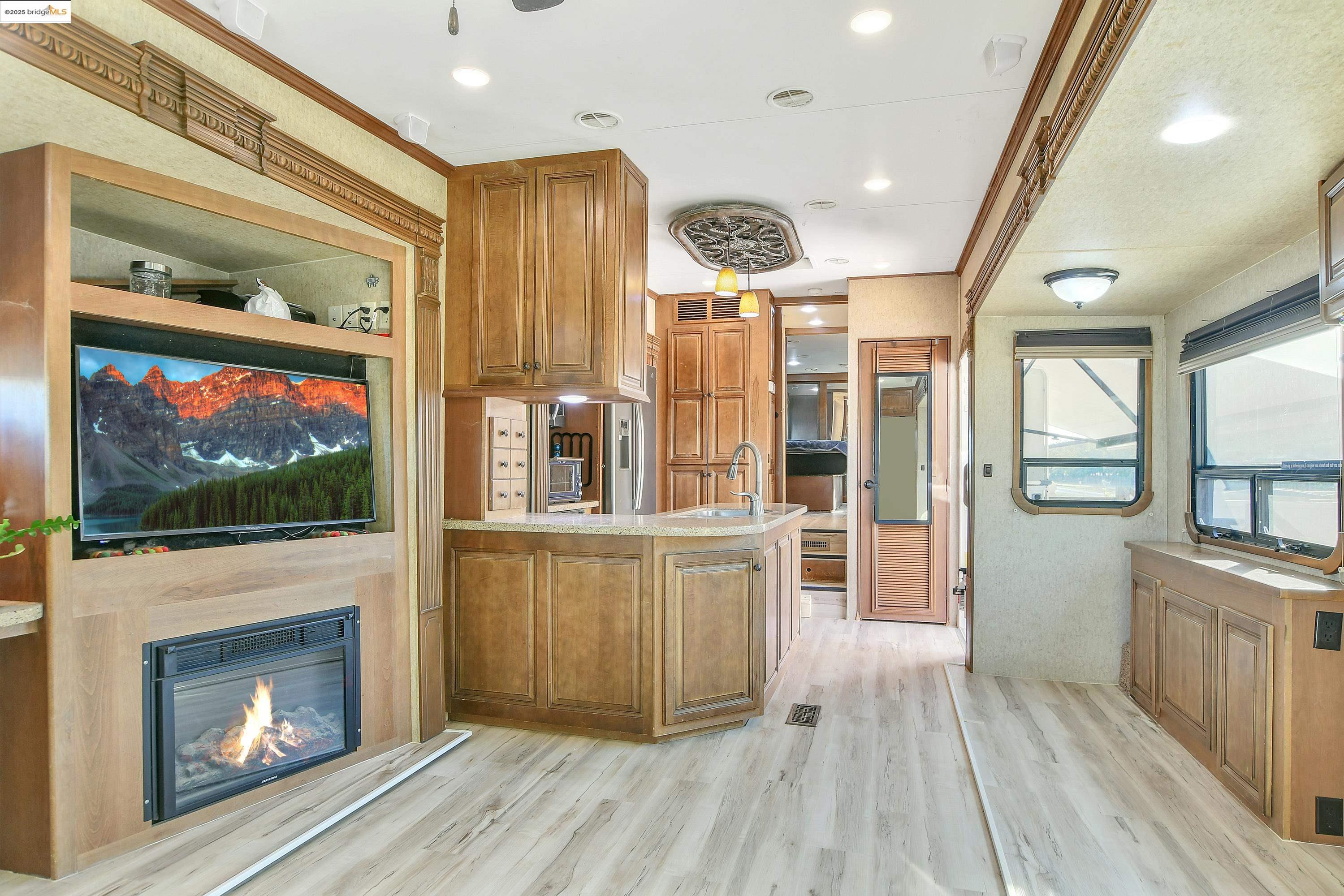 23701 Marsh Creek Road Brentwood, CA 94513 - Photo 29 of 52 a living room with furniture and a fireplace