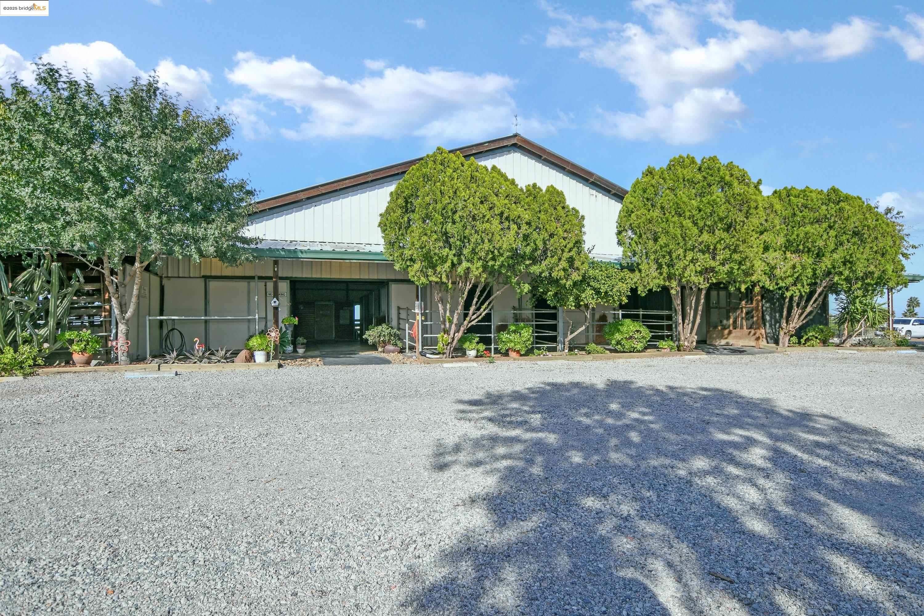 23701 Marsh Creek Road Brentwood, CA 94513 - Photo 35 of 52 a view of a house with backyard and a tree