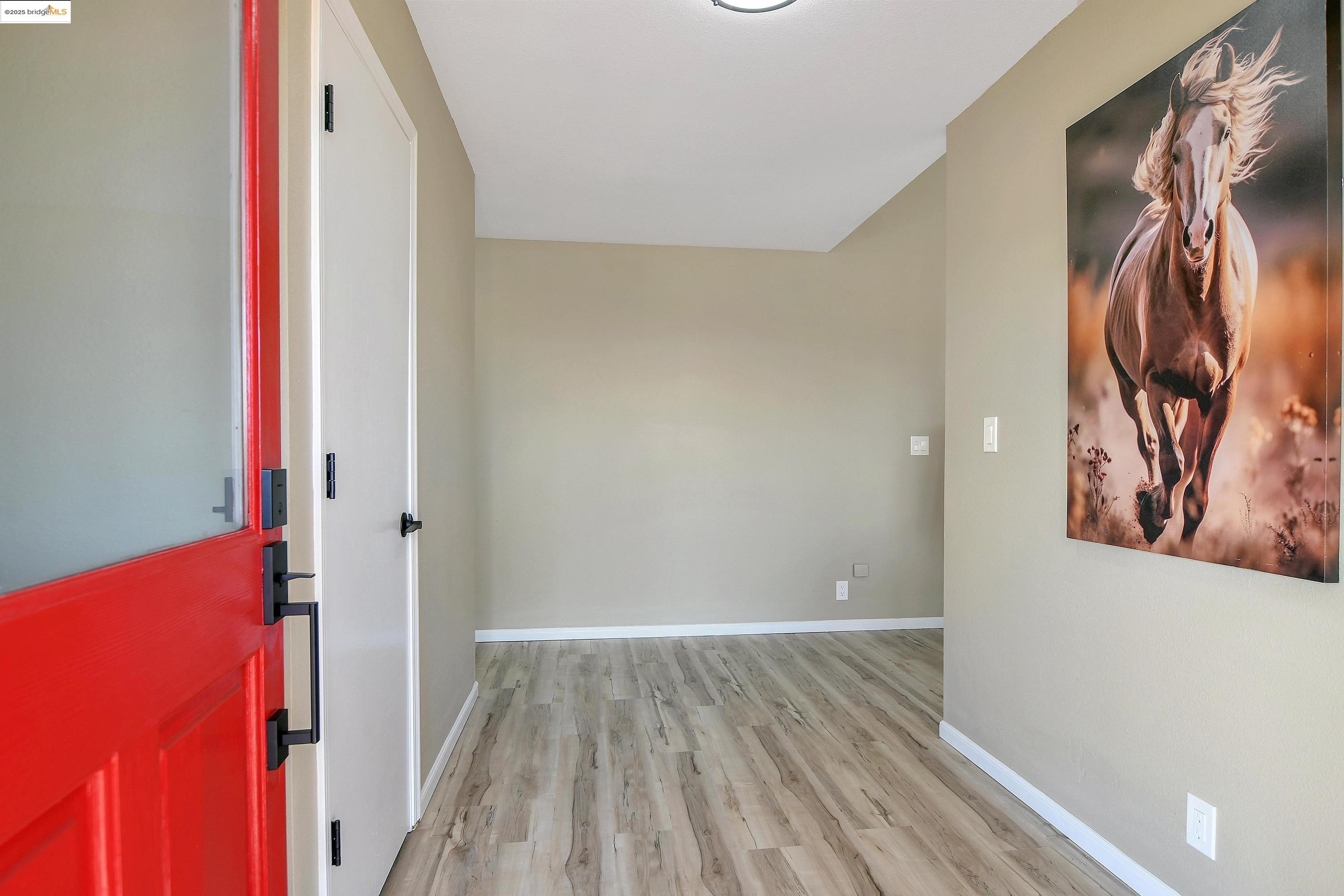 23701 Marsh Creek Road Brentwood, CA 94513 - Photo 4 of 52 a view of hallway with wooden floor