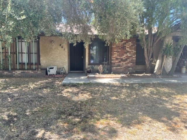 461 West Chaparral Street Rialto, CA 92376 - Photo 1 of 1 a view of a house with a yard