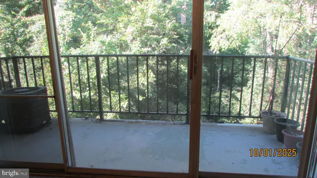 a bathroom with a granite countertop toilet a sink and a bathtub