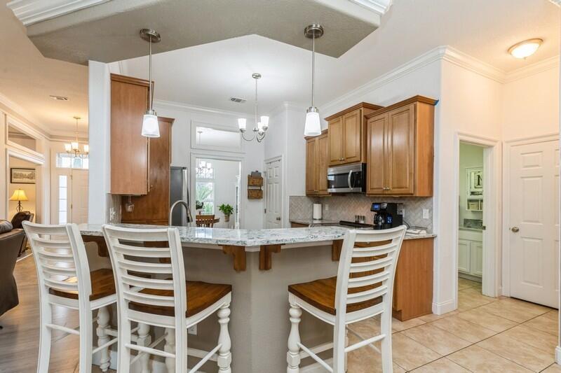 2903 Chancery Lane Crestview, FL 32539 - Photo 16 of 43 a kitchen with a sink stove and cabinets
