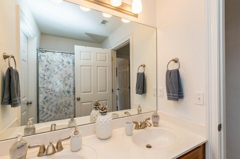 2903 Chancery Lane Crestview, FL 32539 - Photo 24 of 43 a bathroom with a sink and a mirror