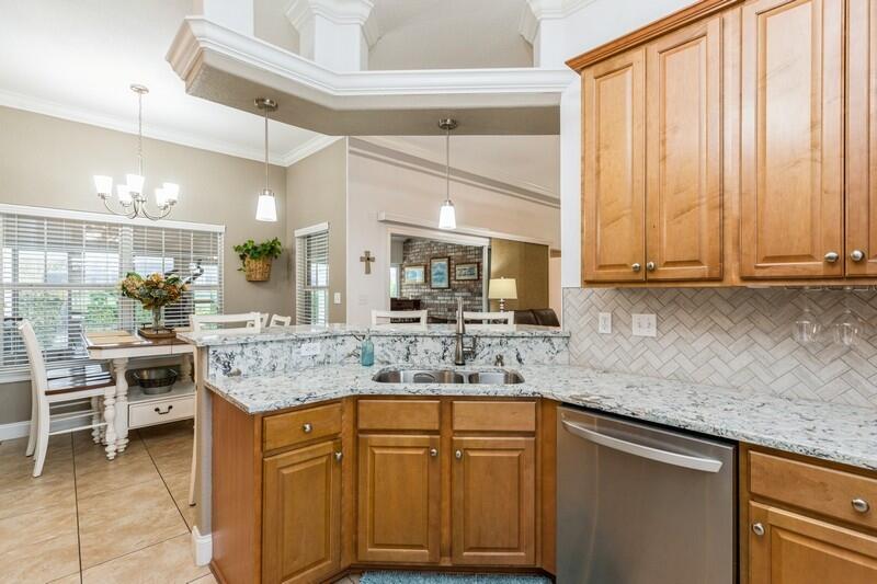 2903 Chancery Lane Crestview, FL 32539 - Photo 3 of 43 a kitchen with stainless steel appliances granite countertop a sink stove and cabinets